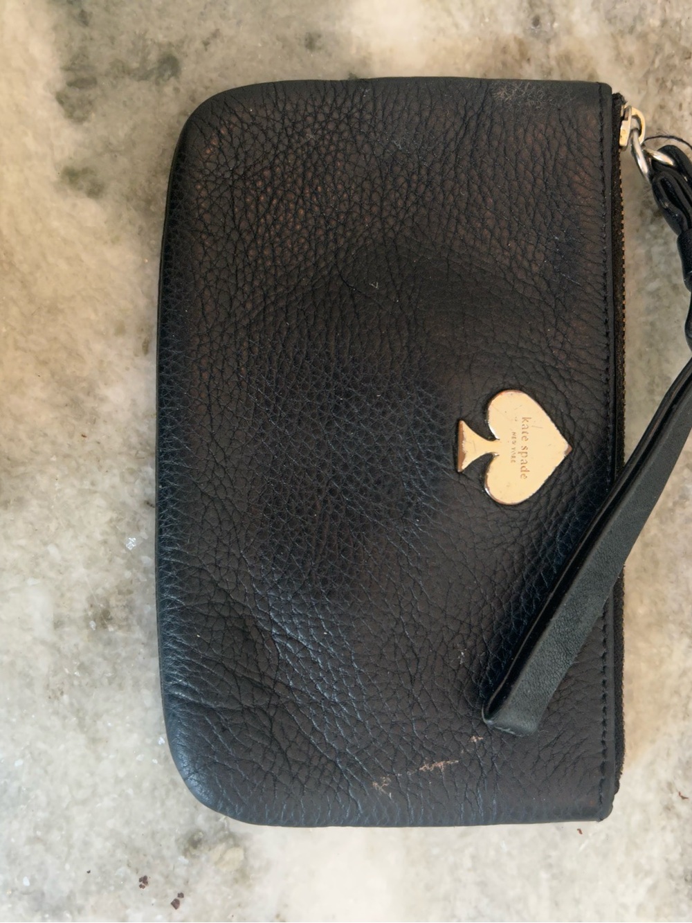 kate spade black leather wristlet with gold spade emblem